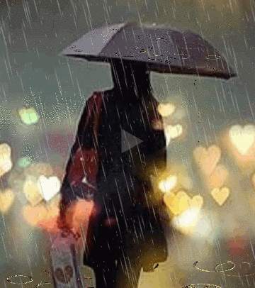 女人下雨天打伞的动态图